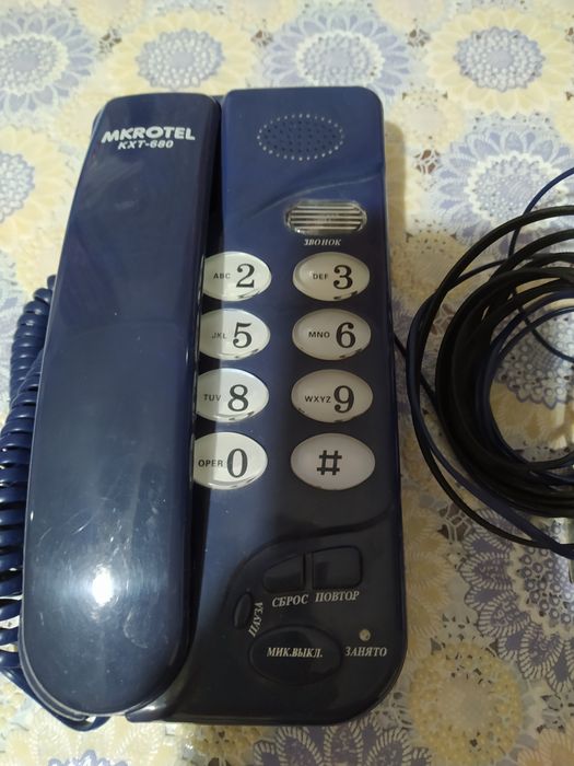 Продам  тюнер  от  спутниковой  антенны и телефон