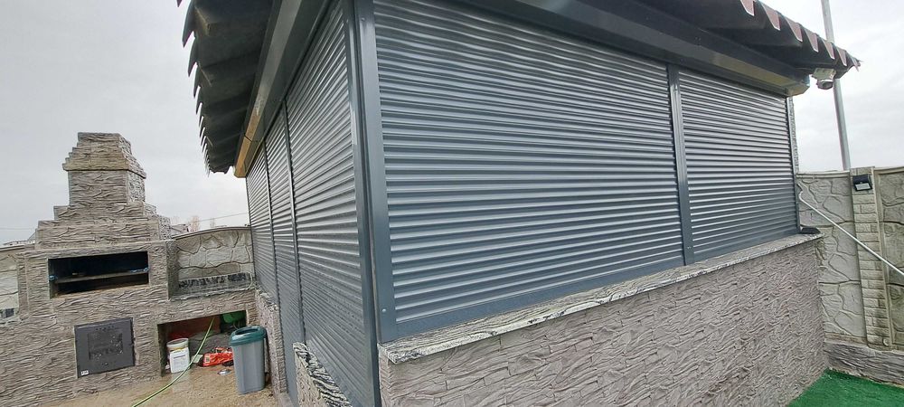 RULOURI Aluminiu si Usi de garaj rezidentiale SECTIONALE