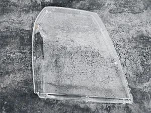 Стекло фары кадилак эскадейд