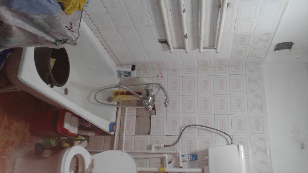 Коттедж зади ЦУМа