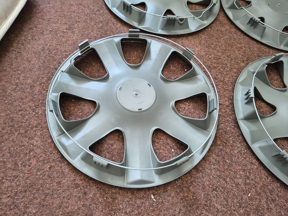 Capace jante roti R 14 Ford Focus Fiesta  Ka ..etc
Capacele sunt Noi .nefolosite