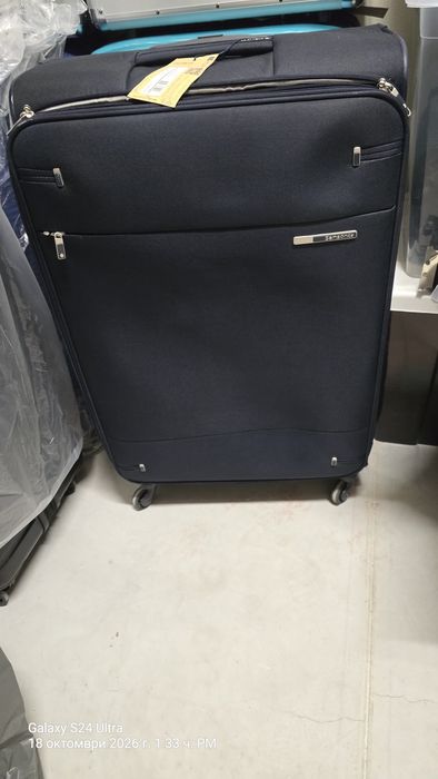 голям текстилен куфар Samsonite Base Boost Spinner