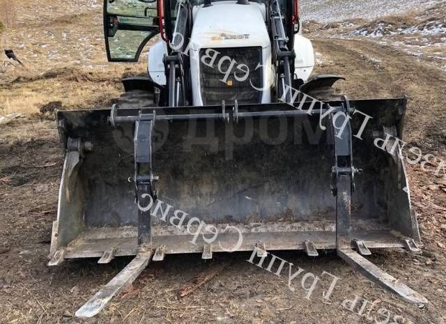 Услуги экскаватора-погрузчика.