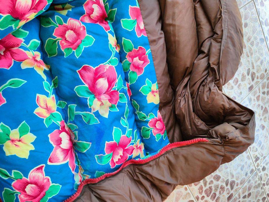 Sac de dormit din puf de gasca rezistent la frig