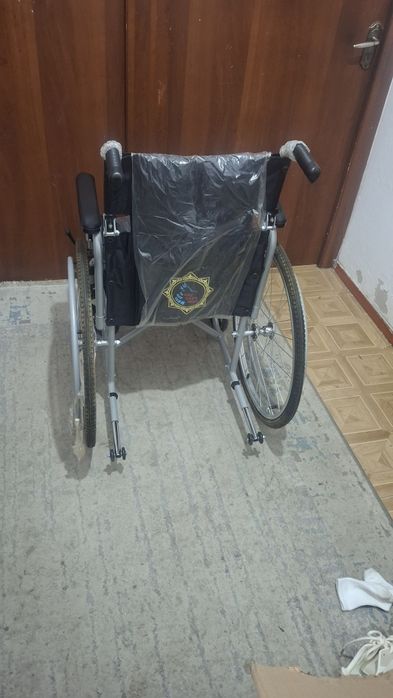 Инвалидная коляска