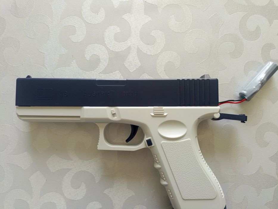 водяной пистолет игрушечный