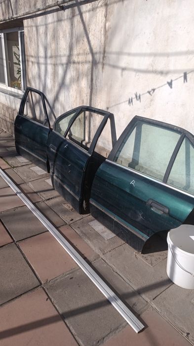 Привозные Двери БМВ е34 зелёные