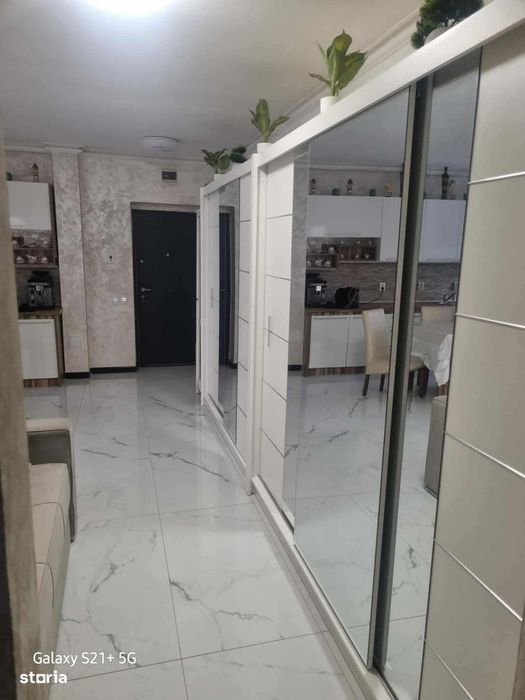 Apartamnet cu 3 camere,gradinaa si parcare cu CF,zona Eroilor-Floresti