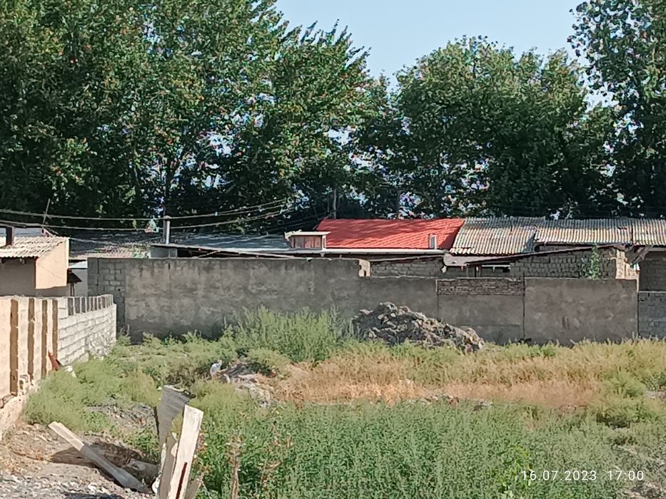 Тайлок туман Богизогон марказида битказилмаган бино сотилади