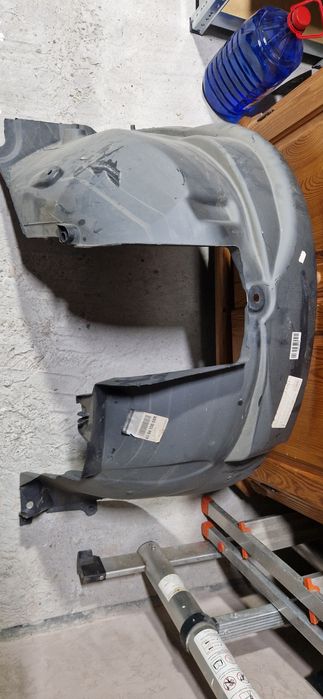 Carenaj roată față dreapta si stanga Dacia Duster