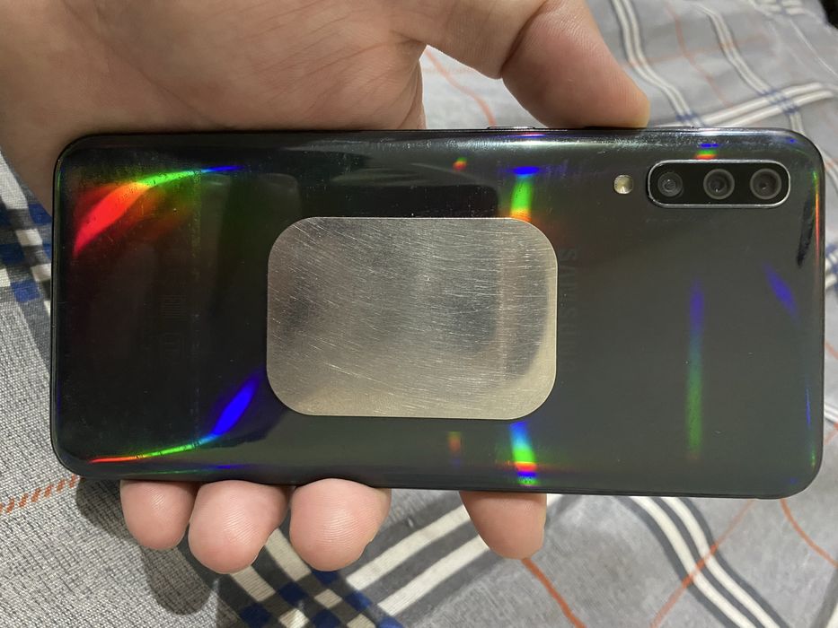 Самсунг а50 64гб