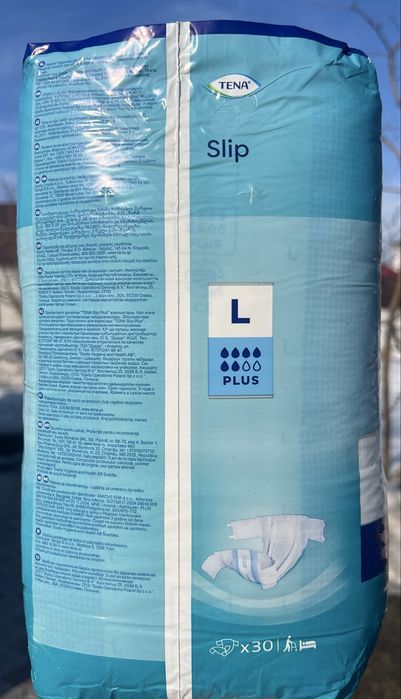 Продам памперсы Tena L размер