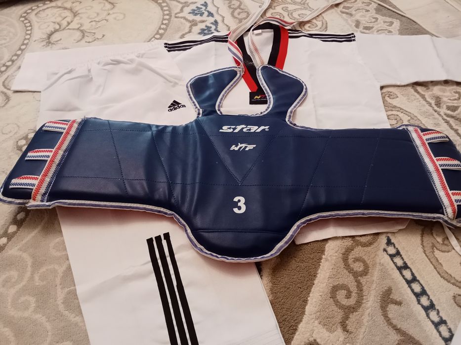 Продам новое кимоно таеквондо