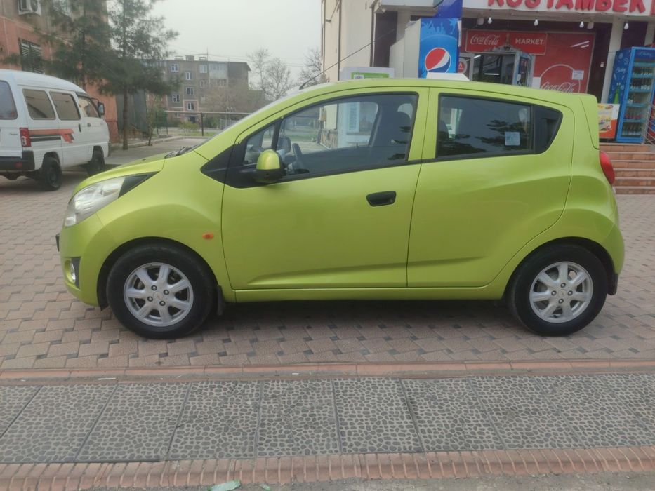 Spark  2011 Aftamat 4pazitsiya  223ming yurgan  kraska 30% oldi orqa p