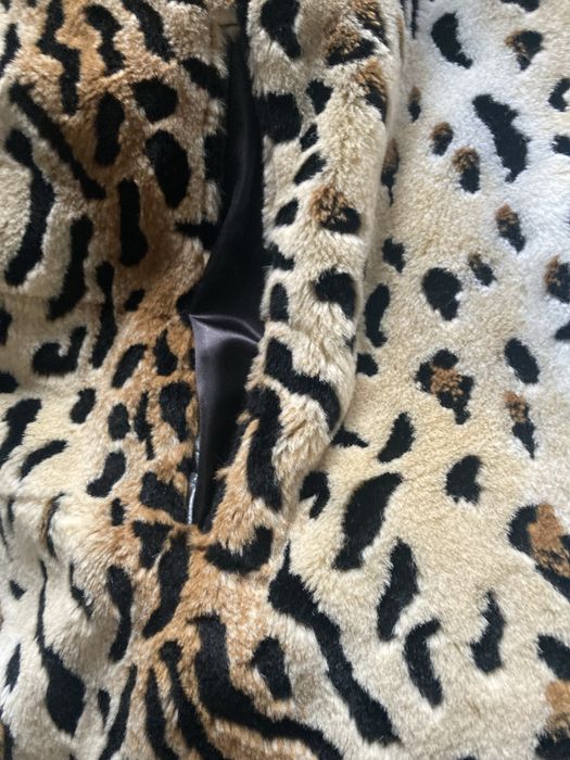 Capa blana artificiala groasa ,bine intretinuta fara urme de uzura