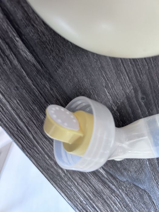 Помпа за кърма Медела medela с два неизползвани на