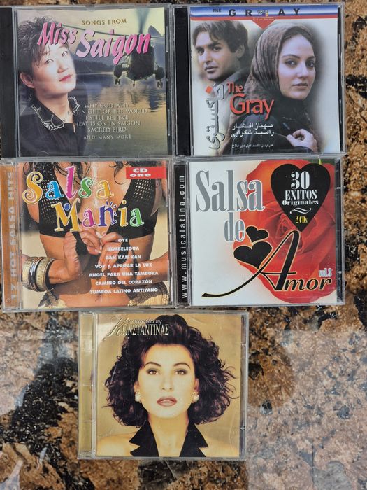 Vând 17CD muzica Country, salsa,grecesca,mixta  artisti internationali
