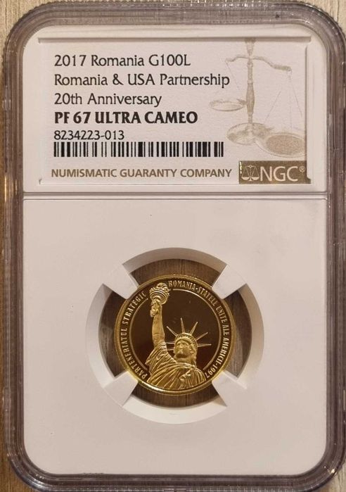 Moneda aur BNR 100 Lei, parteneriat Romania-SUA, gradata NGC PF 67 UC