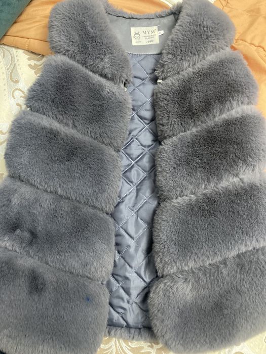 Меховая жилетка