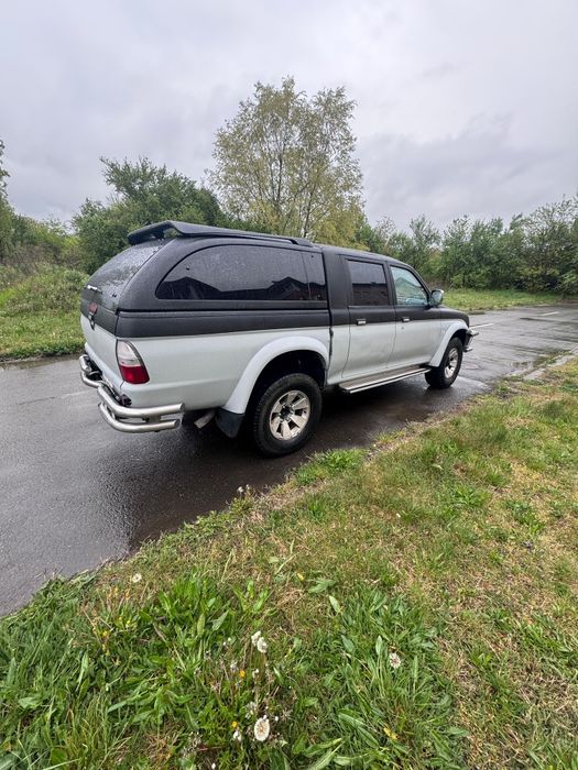 Mitsubishi L200 4x4 • 2.5 Diesel • 2006 • Echipată Off-Road • Întreținută • 7000€ Neg

Mitsubishi L200 2.5 diesel, an 2006, autoutilitară, al doilea p