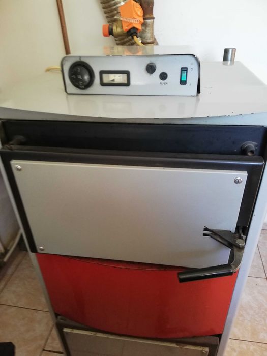 Vând centrala pe lemne Dakon cu gazeificare 23kw