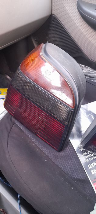 Set stopuri Hella fumuri VW golf 3 GTI complecte  cu socluri .