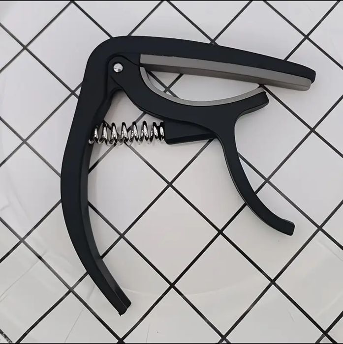 Каподастр для гитары