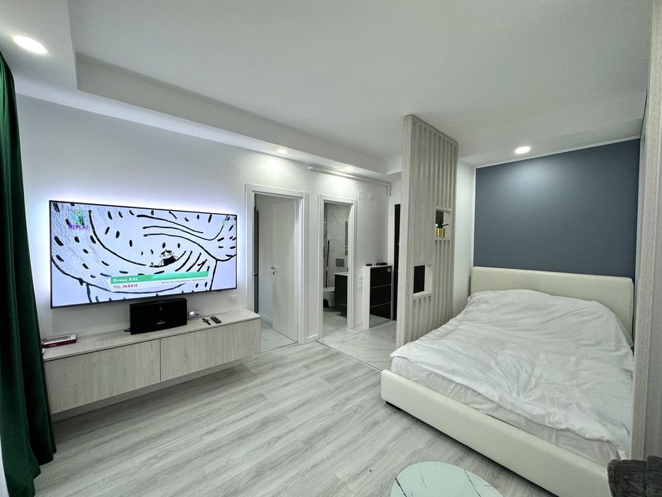 Studio tip garsoniera Cosmopolis parter cu gradina si loc de parcare