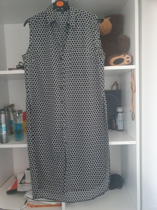 Bluza lunga desfăcuta pe laterall