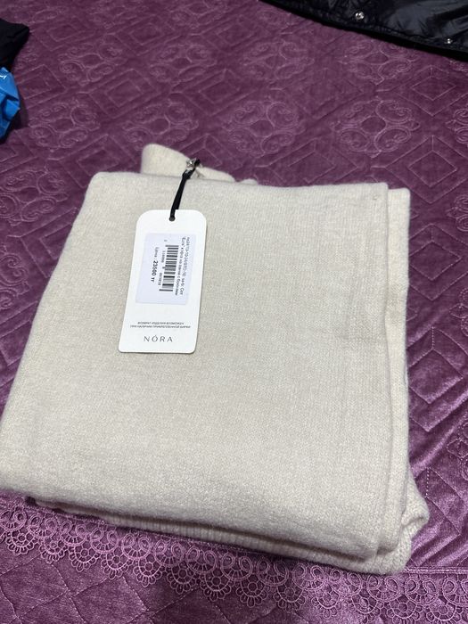 Продам теплый костюм от NORA