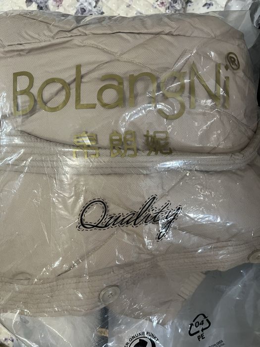 Продам новый пуховик