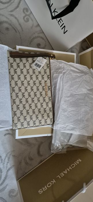 Продам Клатч Michael Kors