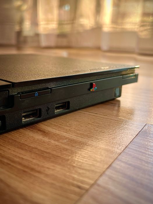Ps2 slim + една игра
