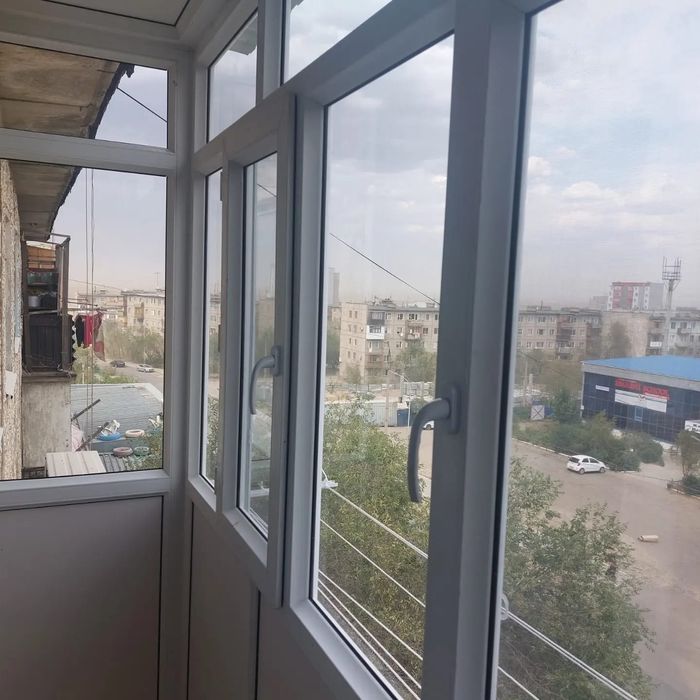 Пластиковые окна балконы