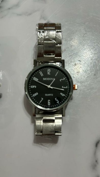Продам новый часы MODIYA
