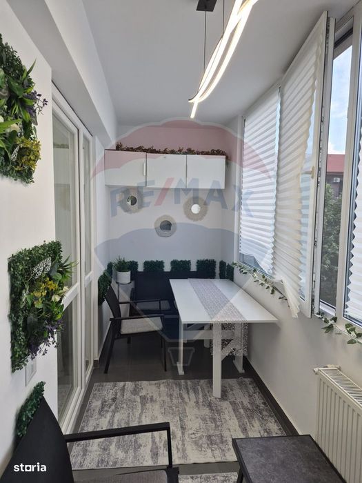 Apartament luminos cu 2 camere, mobilat complet si cu loc de parcare
