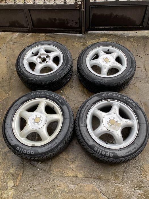 Продавам 4 алуминиеви джанти с летни гуми с размер 185/60 R 14 82 H
