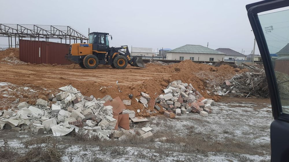 Погрузчик Камаз.