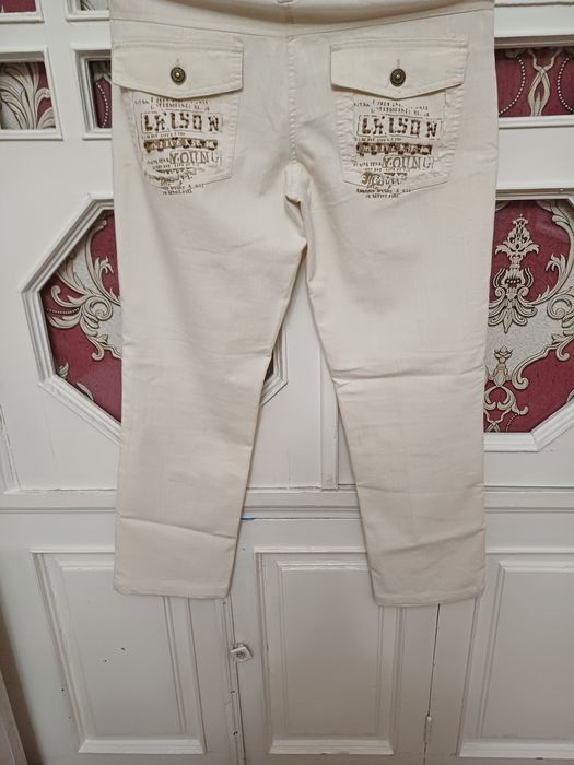 Продается  бежевый брюк