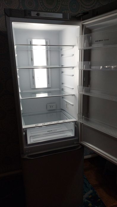 Холодильник Бирюса серебристый