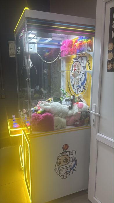 автомат с игрушками типа “хватайка”