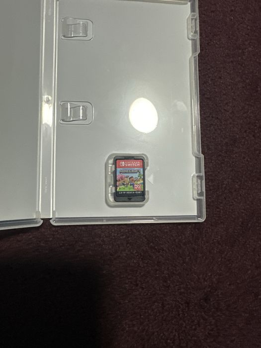 Nintendo switch oled cu geanta si jocul minecraft