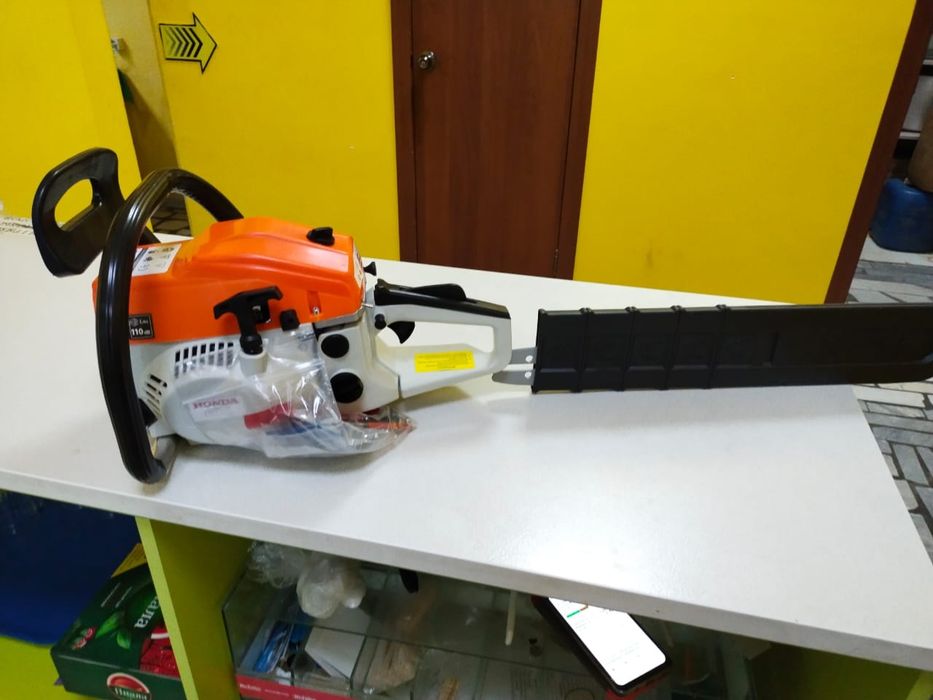 Бензиновая пила Хонда