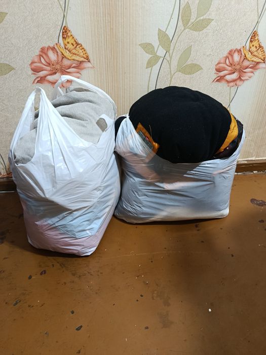 Пакет детских зимних курток и комбинезонов