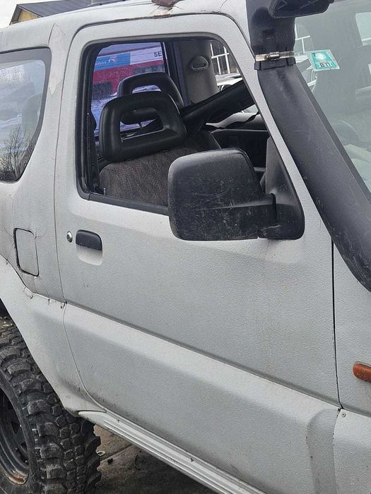 Usa dezechipata stanga/dreapta fata Suzuki Jimny 2003