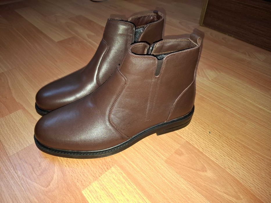 Продам новые сапоги мужские