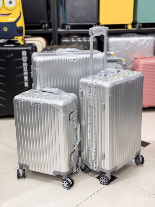 Чемоданы 4 колесные из алюминия