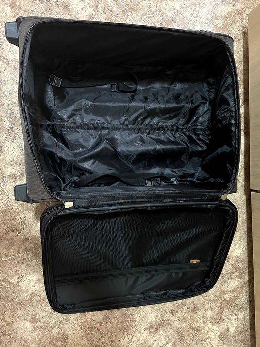 Чемодан тёмно-коричневый (4500 тг)