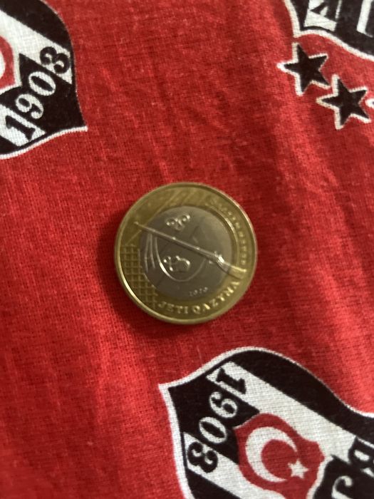 Монета jeti qazyna