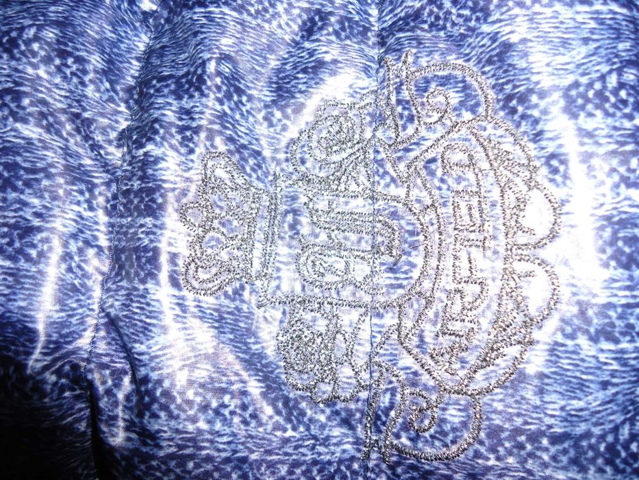 Продам Фирменный пуховик